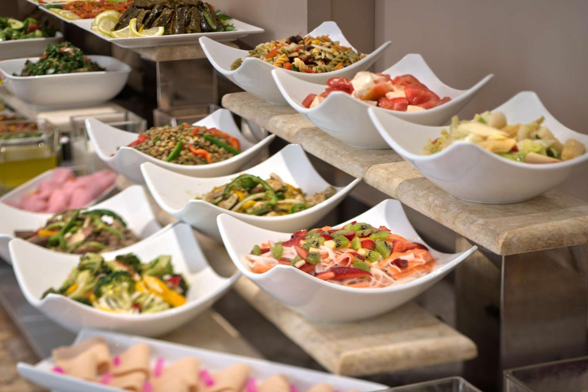 Radisson Blu Martinez Beirut Hotel Exterior photo A selection of salads