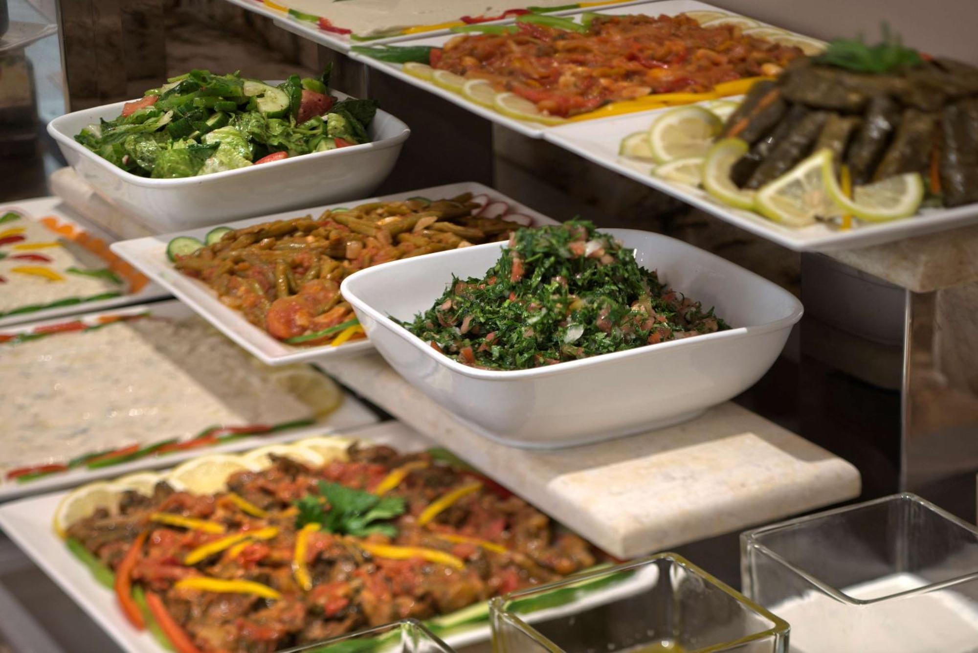 Radisson Blu Martinez Beirut Hotel Exterior photo Meze