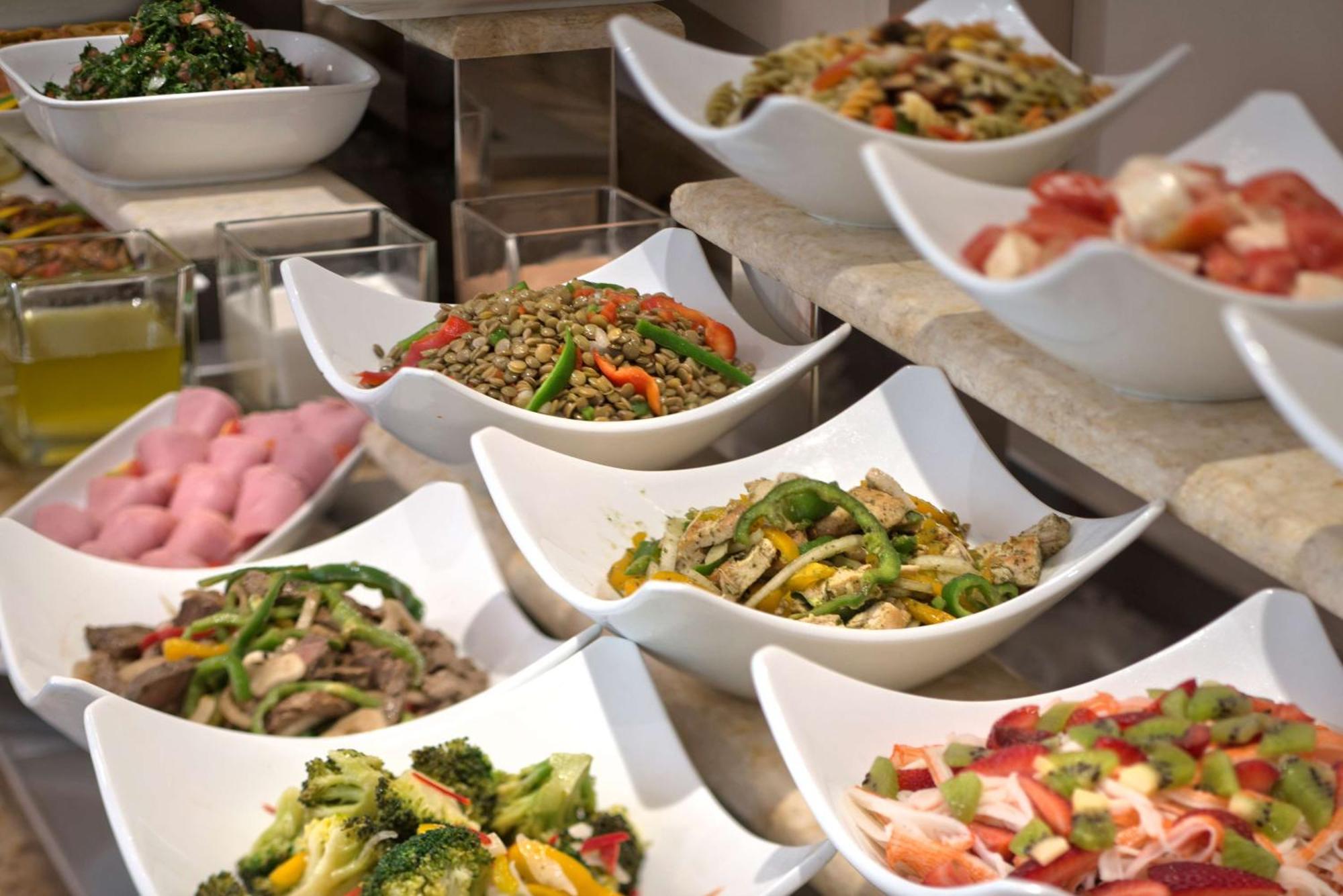 Radisson Blu Martinez Beirut Hotel Exterior photo A selection of salads